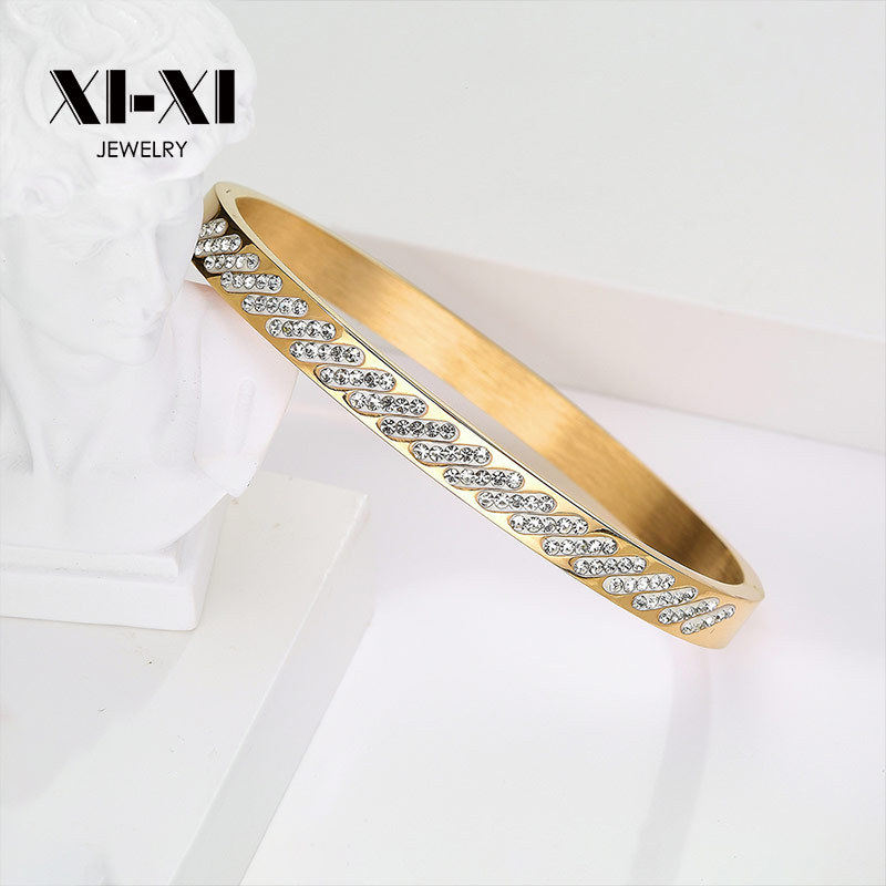 钛钢电镀金色饰品欧美热售满钻手镯斜边设计情侣款手环外贸