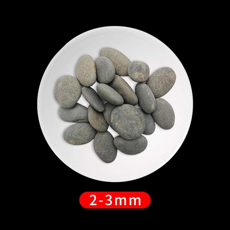 灰色鹅卵石垫层黑雨花石园林绿化鹅卵铺路散置水槽填沟石笼水池用