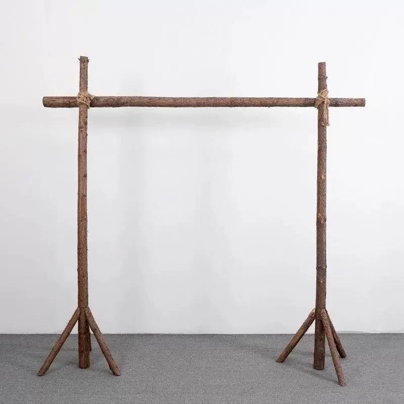 户外森系木桩拱门原木花架草坪背景装饰节日求婚草坪布置道具木架