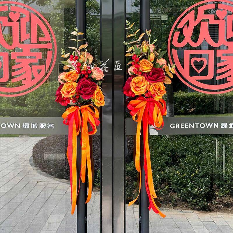 楼盘交付交房商铺开 业单元大堂大门玻璃门把手彷真花束花艺装饰