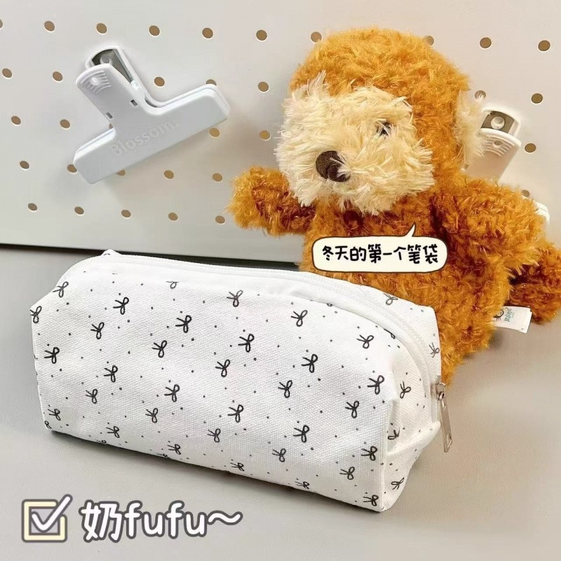 手拿黑蝴蝶结笔袋ins高颜值可爱少女学生化妆包大容量文具手拿包