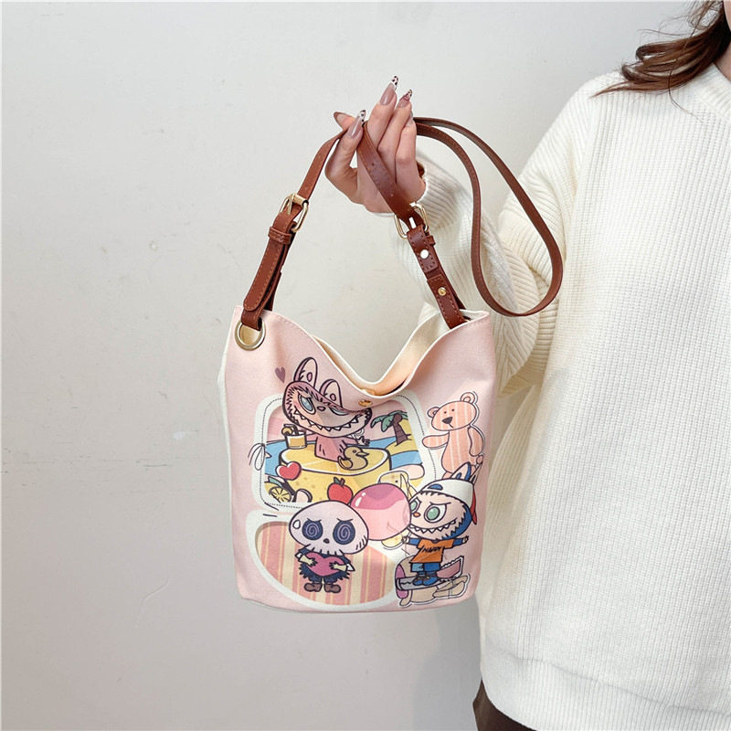 2025年新款卡通大容量帆布包包大学生通勤外出单肩包斜挎包潮玩包,箱包皮具/热销女包/男包,通用款女包,淘宝优惠券,粉丝福利购,淘宝优惠卷