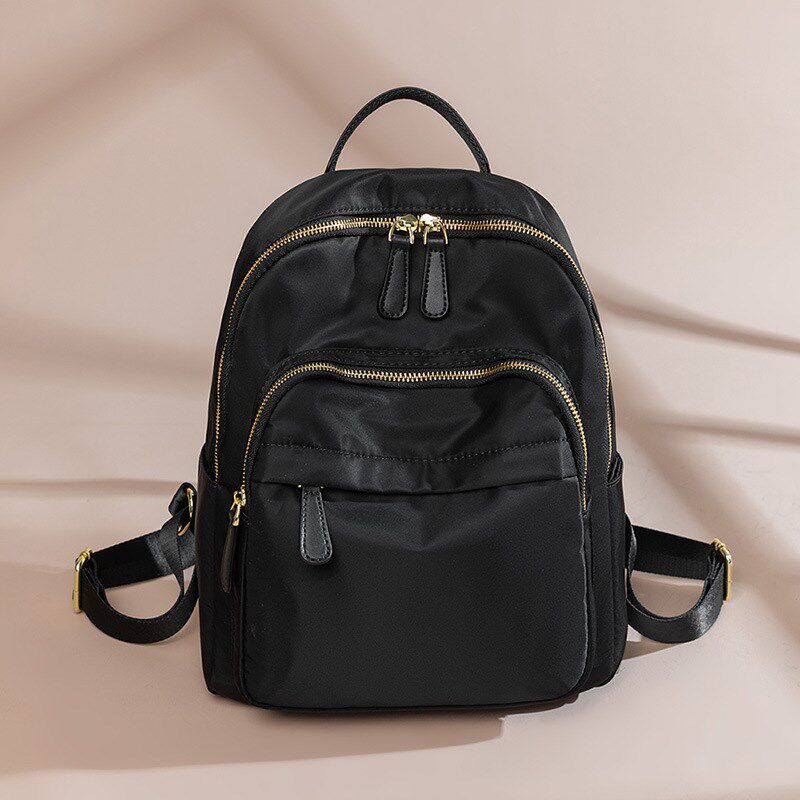 帆布轻便大容量背包女新款韩版潮流时尚简约防水牛津布旅游双肩包