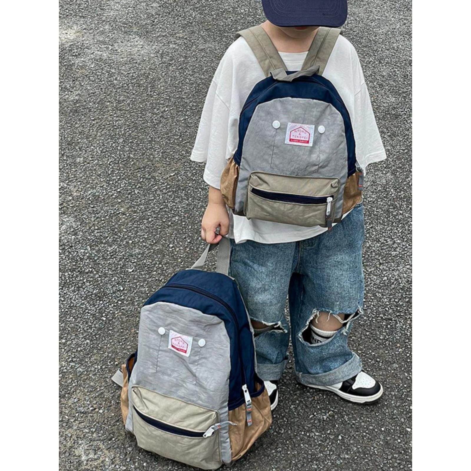 幼儿园书包新款可爱轻便男童洋气双肩布包外出游宝宝小女孩背包潮