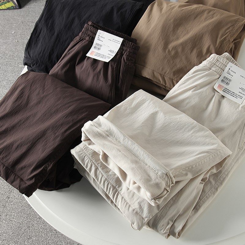 试衣间秋冬款保暖休闲长裤阔感裤松紧宽松百搭工装伞兵裤女470732