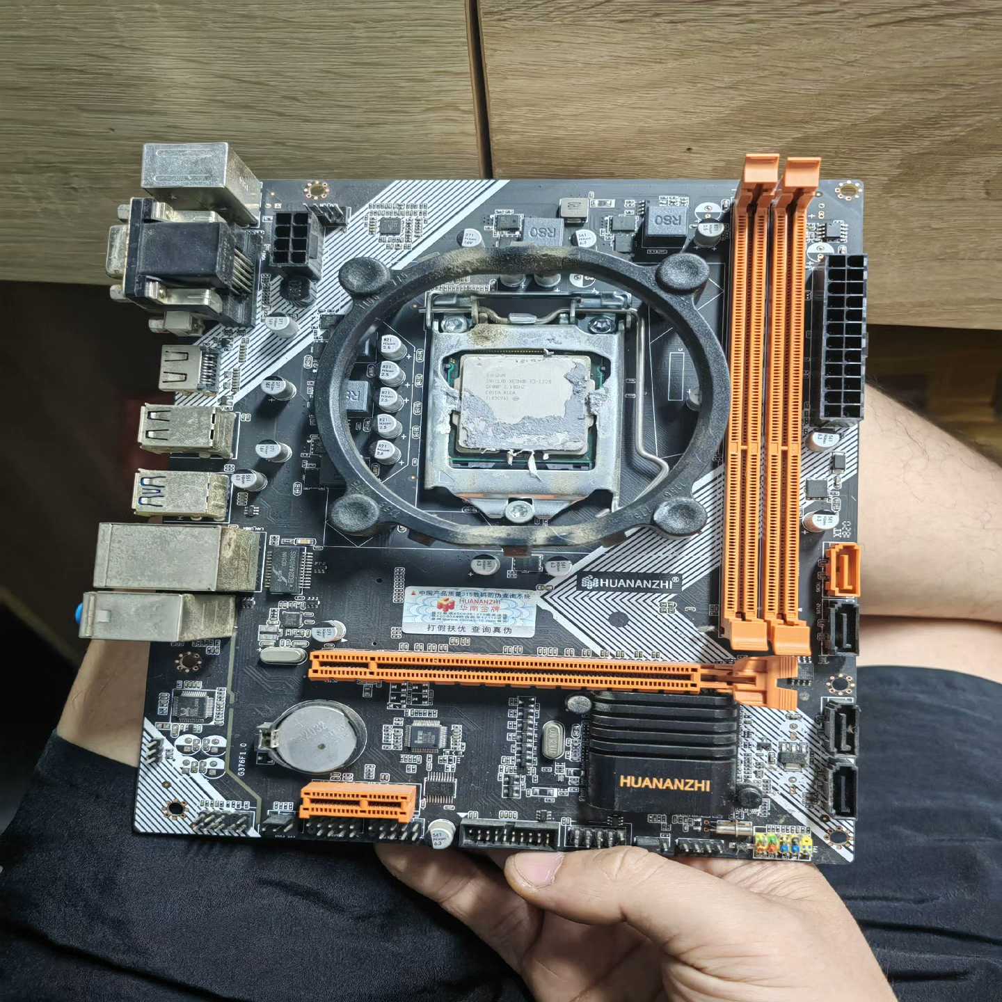 华南金牌主板b75和E1220询价