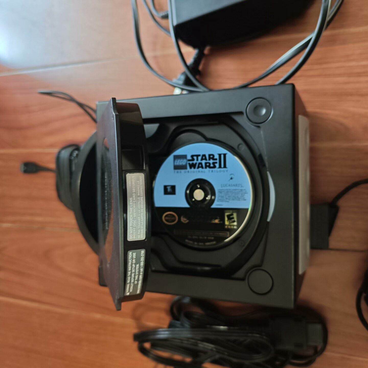任天堂ngc游戏机，功能正常使用，读碟正常。原装110v电源--议价