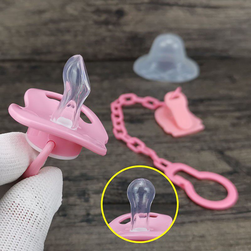 新生儿仿母乳圆形安抚奶嘴矽胶宝宝安睡型拇指型0-3岁通用