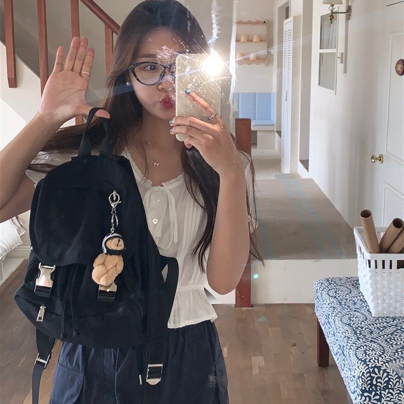 芝士商店~旅游轻便双肩包女设计感黑色背包小众手提书包百搭包包