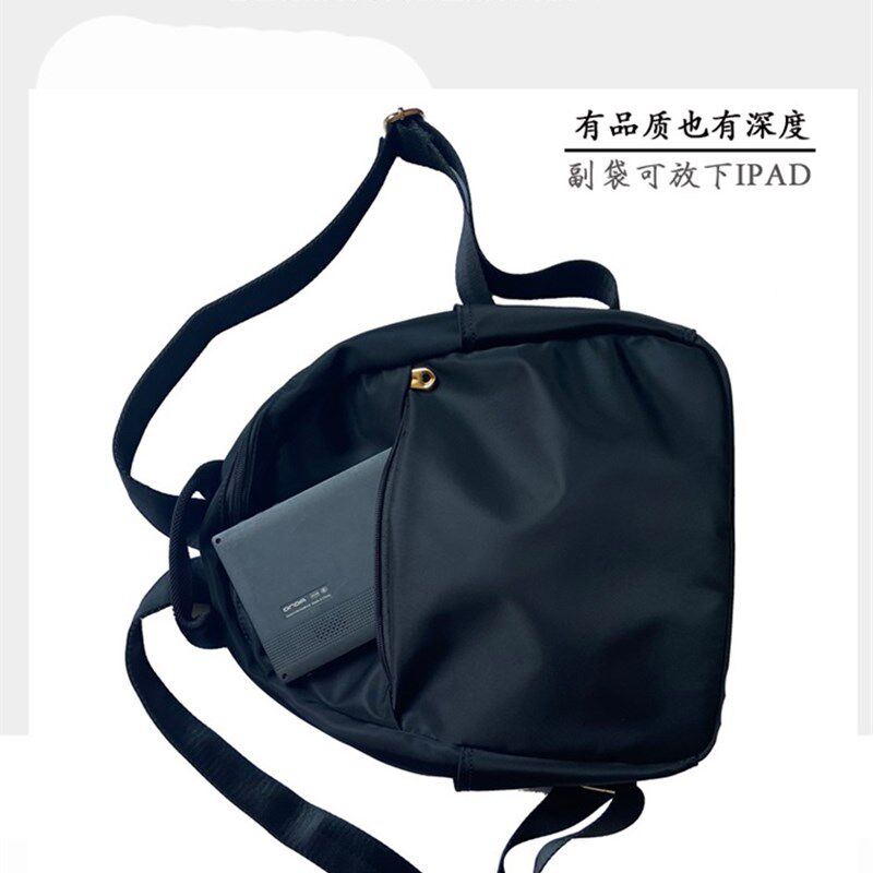 双肩包女2024新款潮旅行防水牛津布小背包通勤轻便帆布纯色小书包