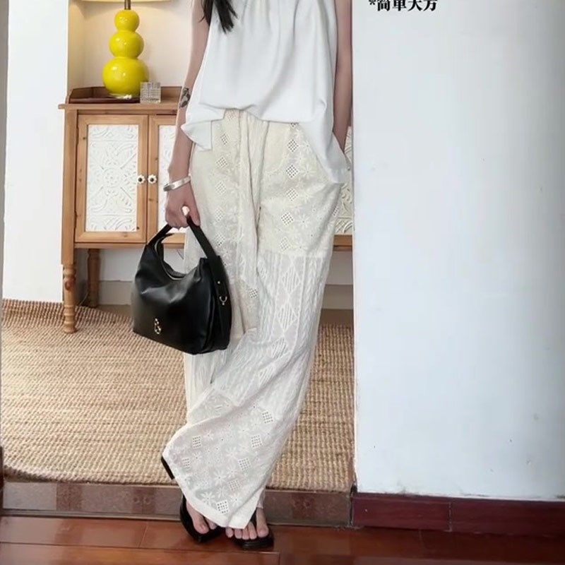 白色时尚印花镂空阔腿裤女2025夏季薄款显瘦百搭高级感慵懒直筒裤
