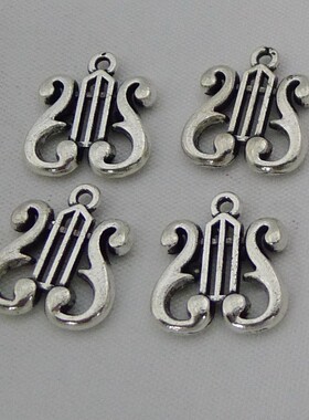 A0652乐器挂件1000克/515个/包1.94克17x15mm古琴合金饰品创意批