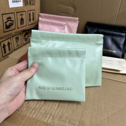弹片收纳包PU自动闭合有线耳机收纳袋零钱包迷你便携式口红化妆包