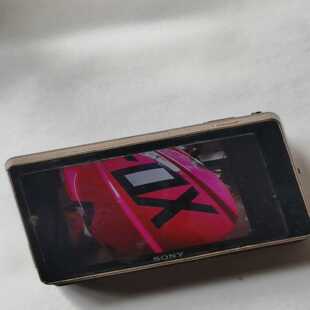 索尼dsc-tx100相机一台，品相实图，后面镜头盖子没有了--议价商