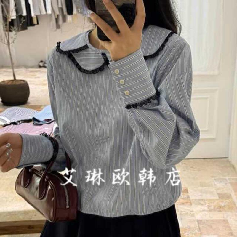 不退48618韩国秋季新花瓣蕾丝拼接蓝色条纹衬衫女