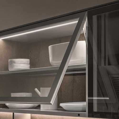 Modern style cabinets with flip-up Blum hinges and quartz co