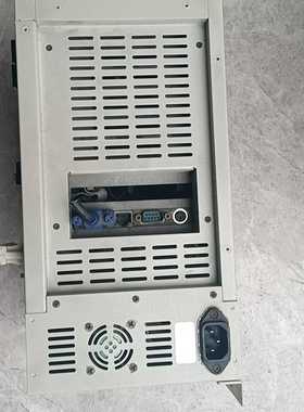 出一台灰色的工业电脑机箱，拥有两个风扇散热和多个接口插槽，外