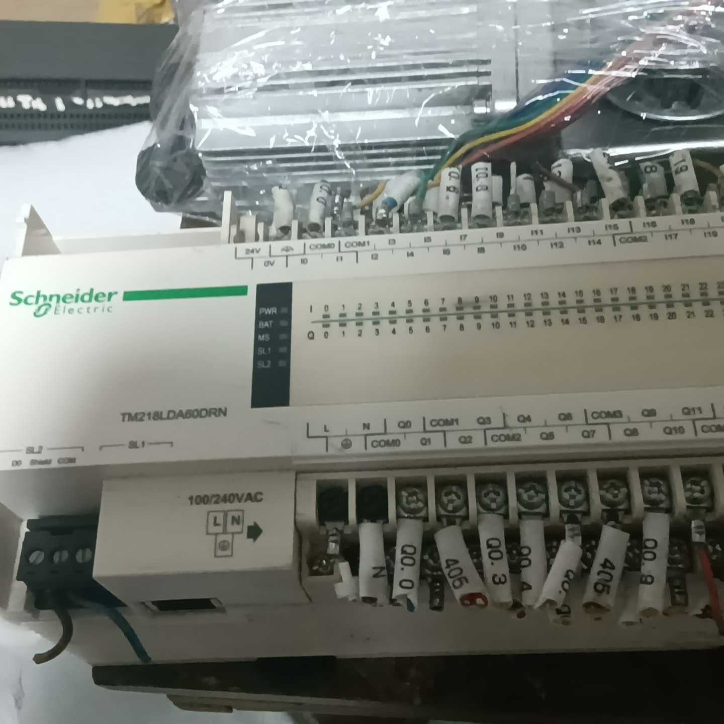 出TM218LDA60DRN施耐德PLC带通讯模块，实物拍摄--议价商品