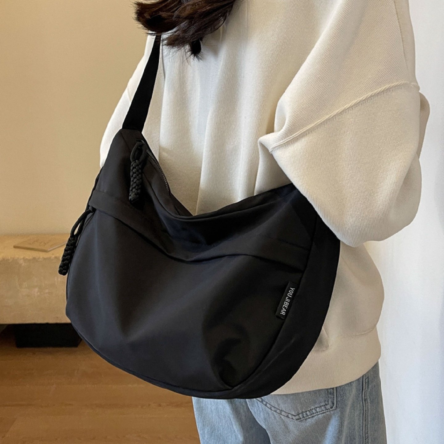 帆布斜挎包女2025新款秋冬时尚休闲单肩包大容量通勤斜挎饺子包