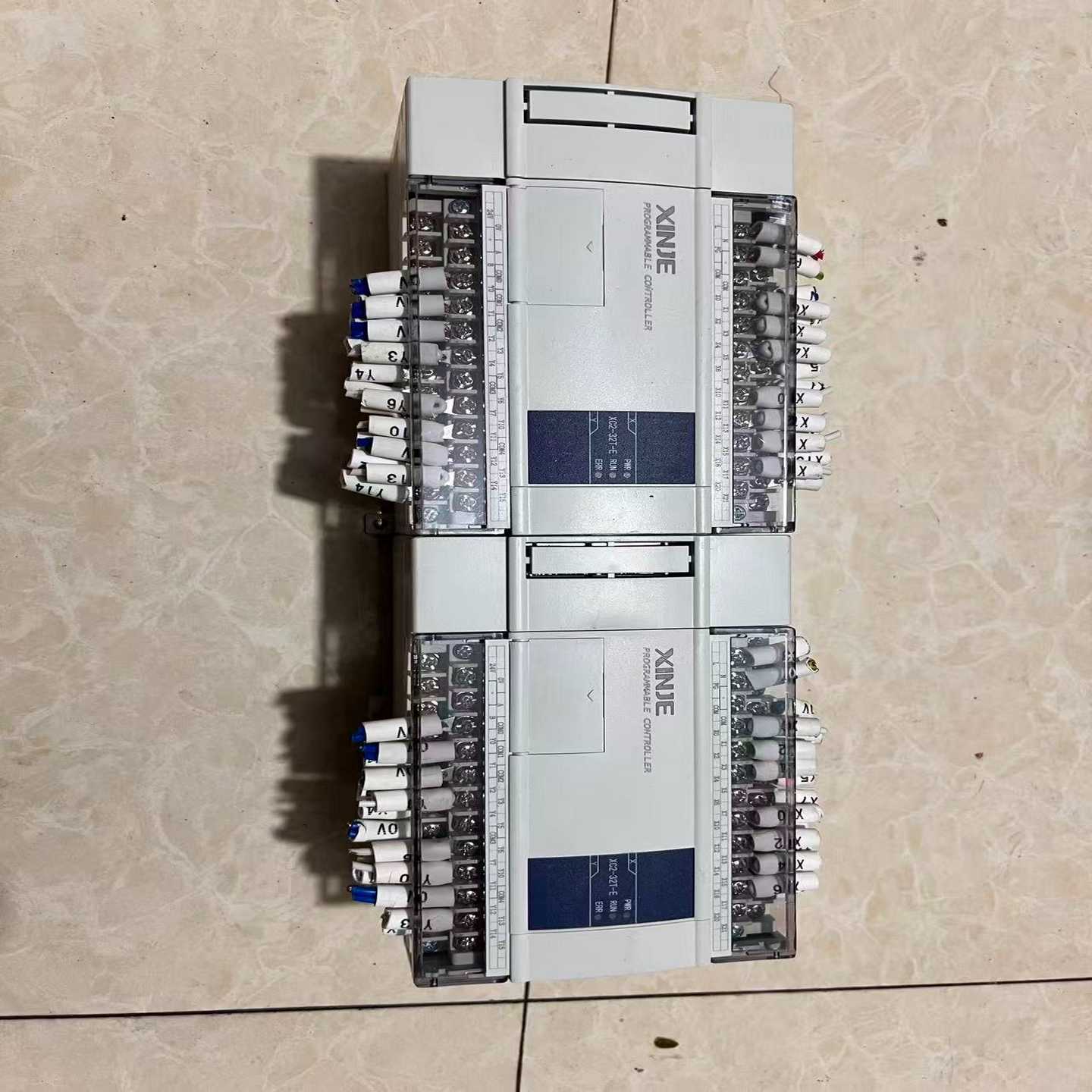 PLC模块XC2-32T-E，型号如图所示，。二