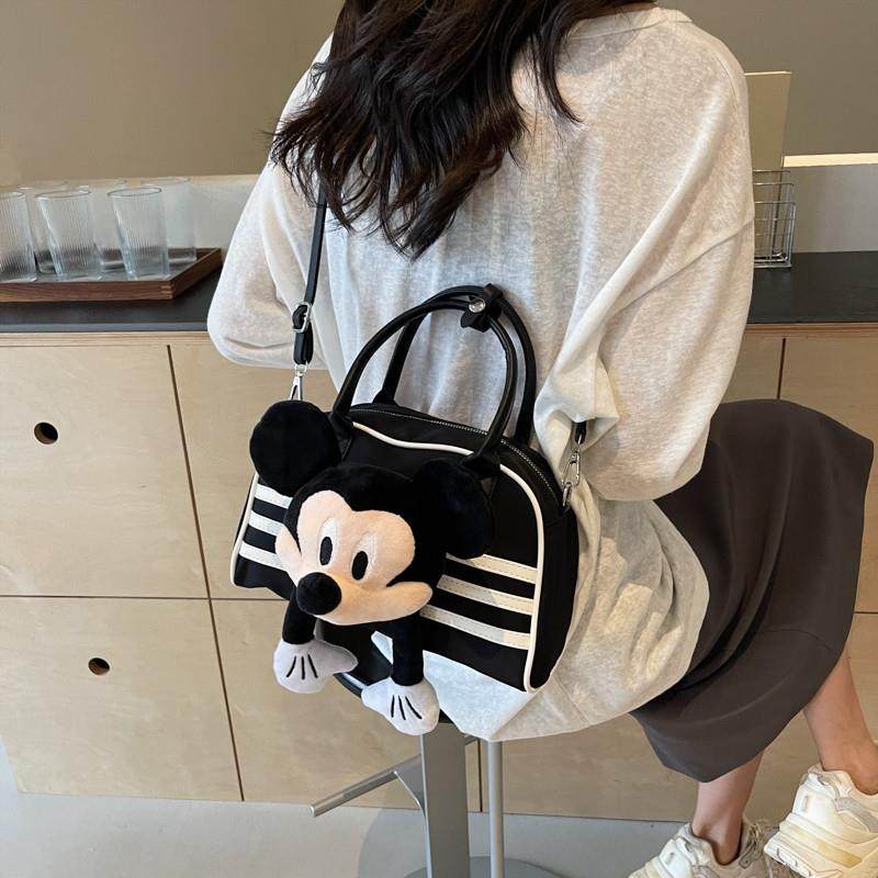 好货可爱保龄球包包女2025新款潮休闲百搭手提通勤包大容量斜挎帆