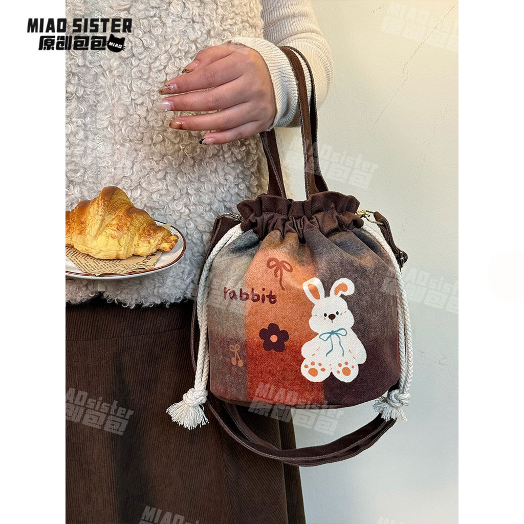 兔叽乖乖秋冬可爱毛绒印花抽绳款可斜挎包便携百搭手提束口包新,箱包皮具/热销女包/男包,水桶包,淘宝优惠券,粉丝福利购,淘宝优惠卷