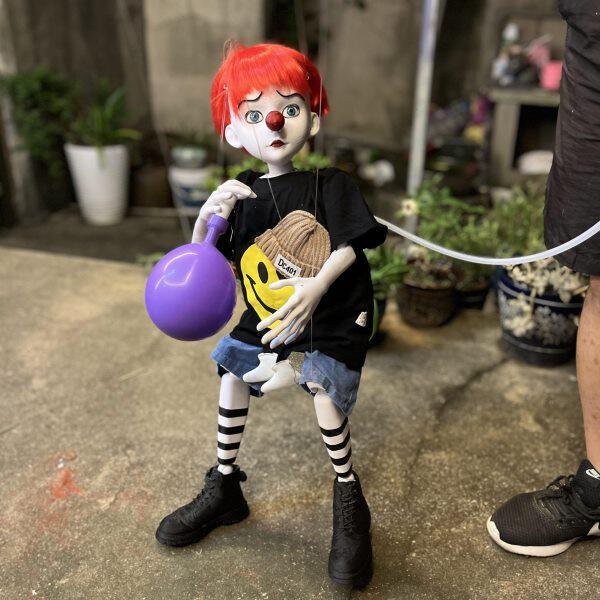 吹气球的少年提线木偶人舞台演出道具街头表演木头人玩具装饰摆件