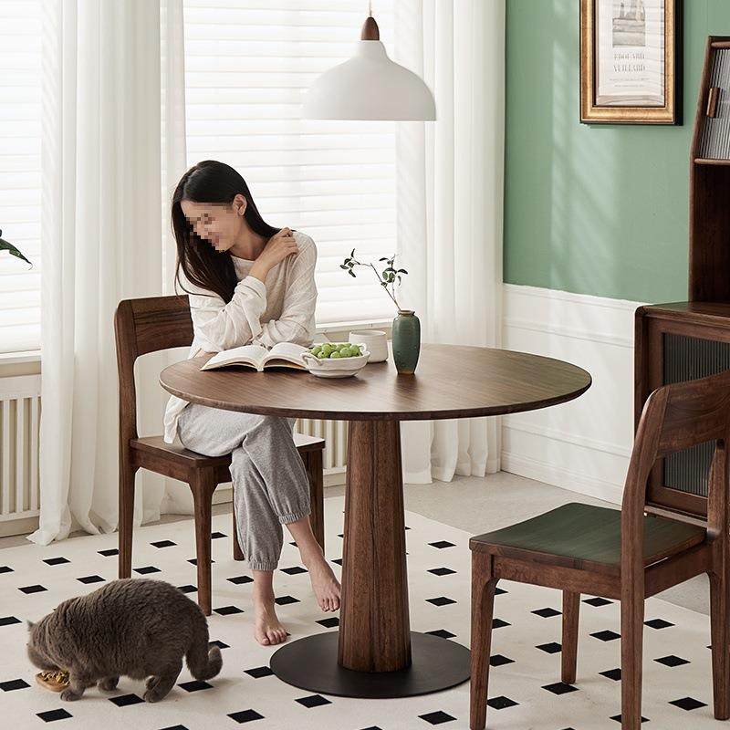 家用饭桌北欧实木餐桌简约作黑胡桃木独腿沁木实木圆桌璞小户型