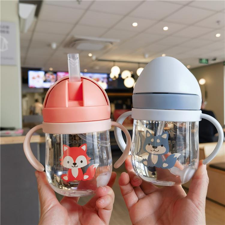 新品儿童咬合吸管杯可爱卡通婴幼儿重力球防呛学饮杯塑料双手柄杯