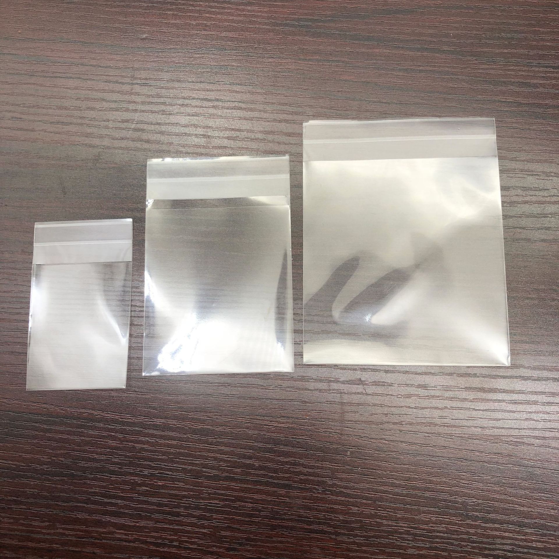 1000个一包现货加厚12丝小OPP透明自粘封口塑料袋迷你PP粘贴袋