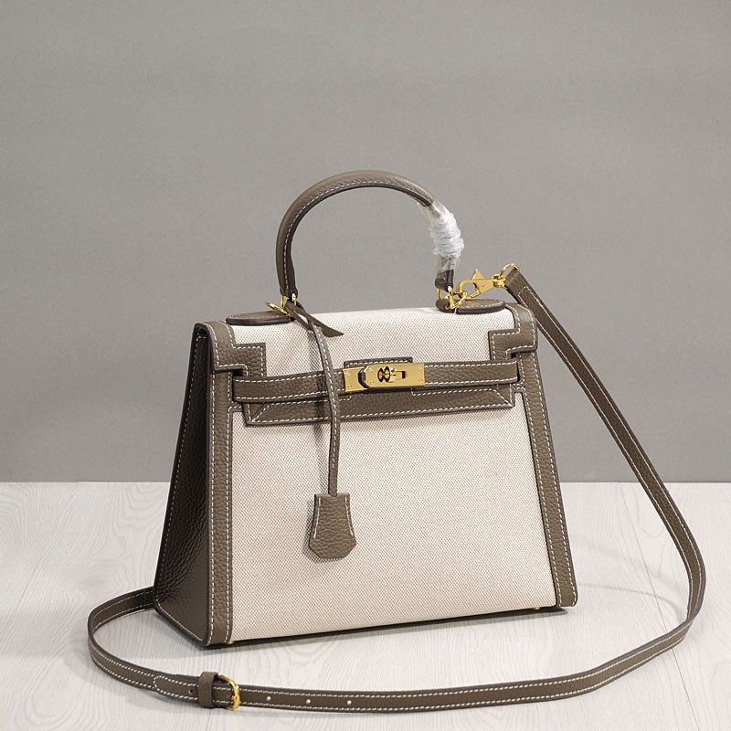 手提头层真皮配麻布凯莉包包女2023新款单肩大包百搭休闲简单女包