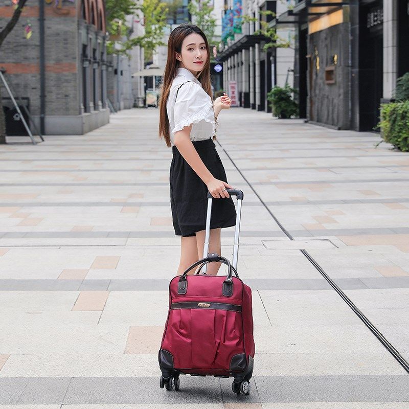 拉杆包旅行袋女手提行李包防水大容量短途旅游出行时尚万向轮软箱