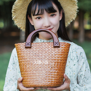 热卖 小巧藤草包文艺编织女包草藤编包复古手提包长裙海草水桶包