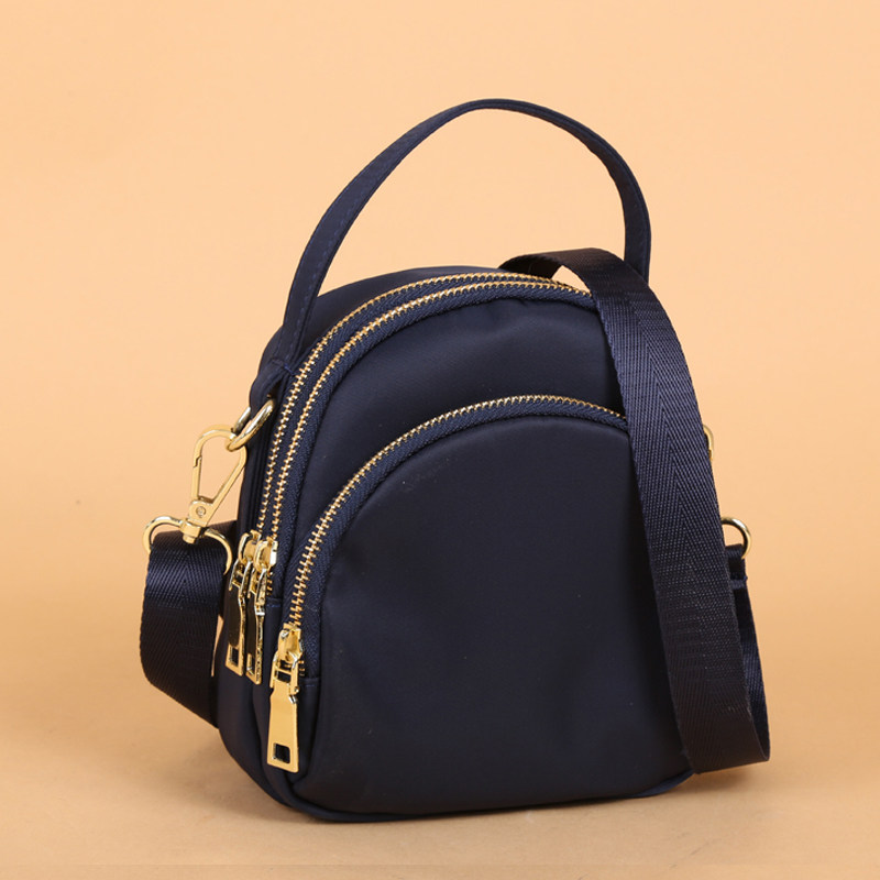 女2021新款轻斜挎包女帆布简约迷你手提中年妈妈小包女牛津布女包