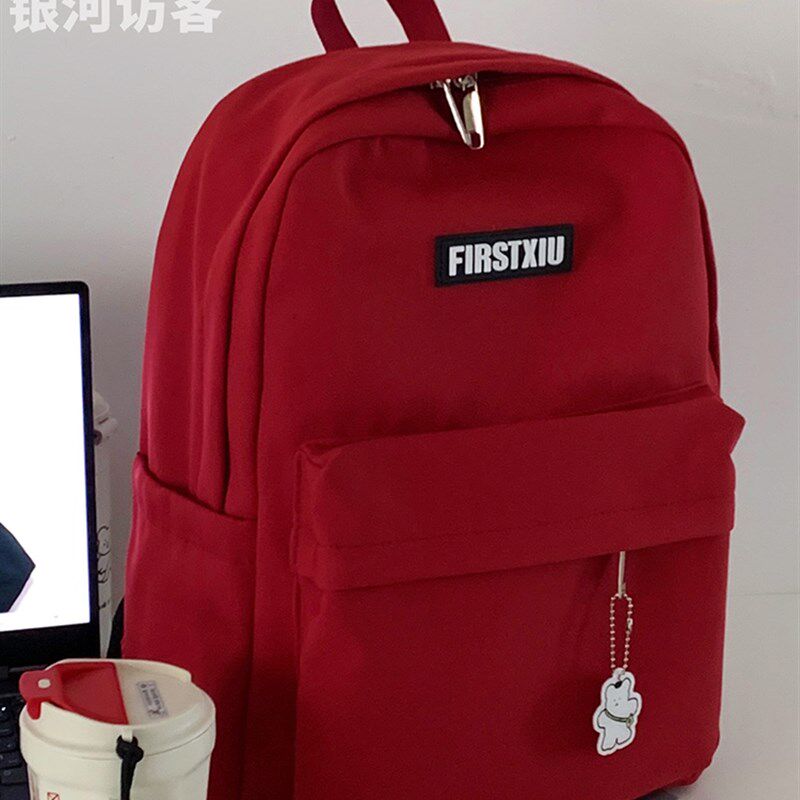 日系复古休闲百搭双肩包女韩版高中学生大学生纯色书包旅行揹包男
