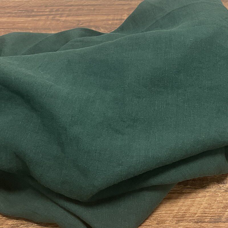 肌理工艺纯亚麻复古墨绿色裤子袍子外套西服连衣裙面料砂洗做旧布