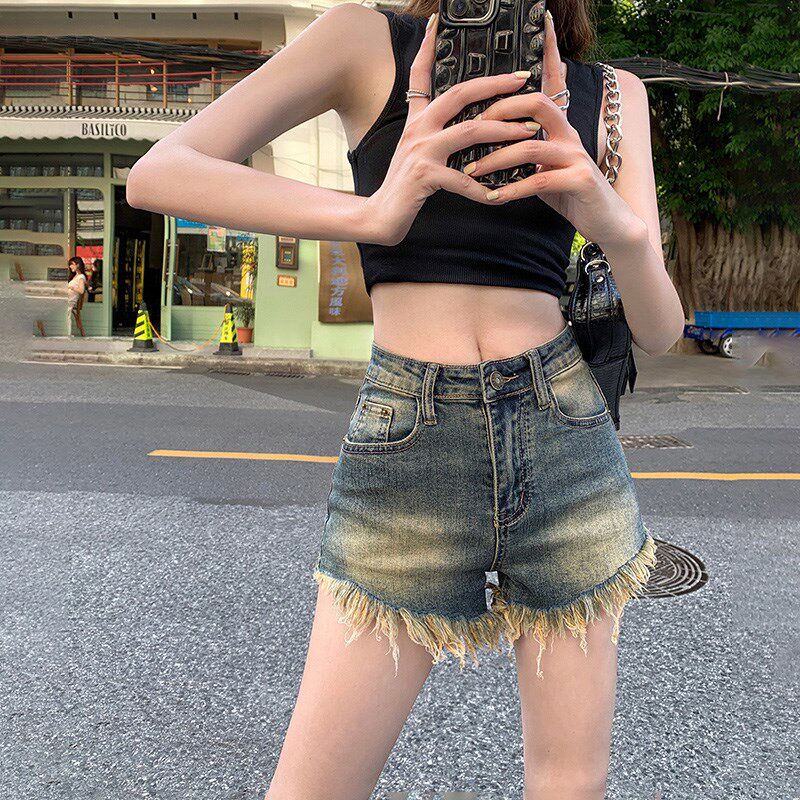 毛边牛仔短裤女夏季新款美式复古辣妹a字做旧包臀高腰紧身热裤女