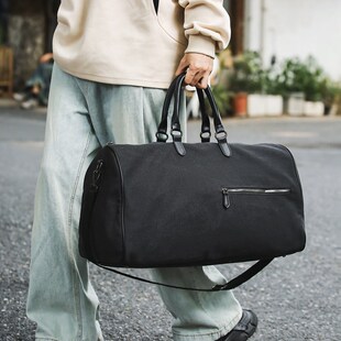 大容量帆布行李包男背包骑行包手提旅行包女运动健身包短途登机包