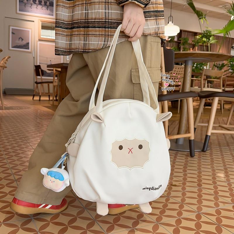 新品帆布包女休闲单肩包手提袋拎书袋百搭大容量学生通勤上课包补