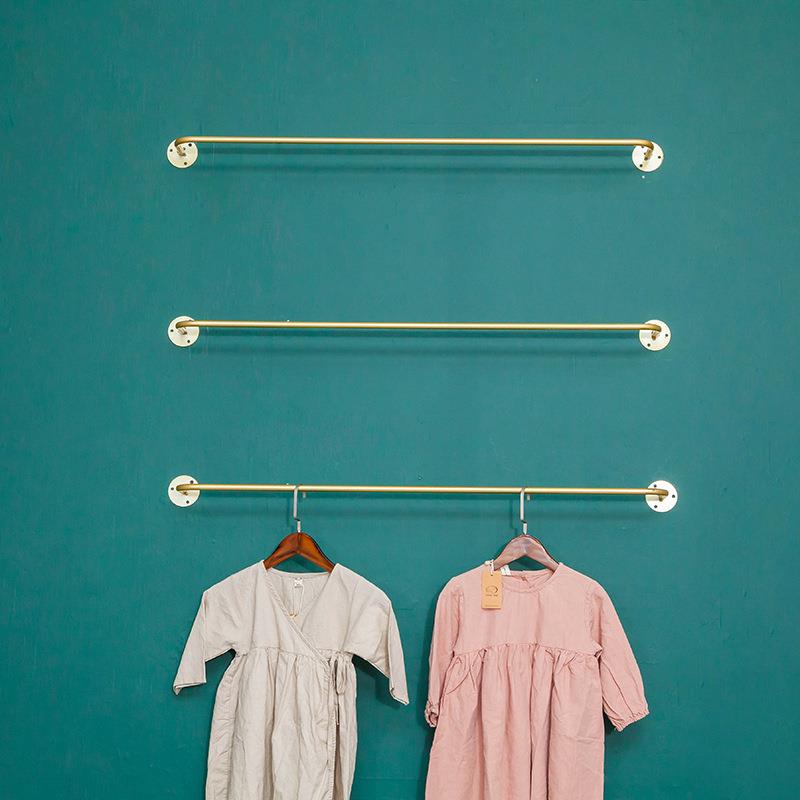 金色服装店展示架衣服上墙服装架女装店装修货架壁挂式细管衣服架