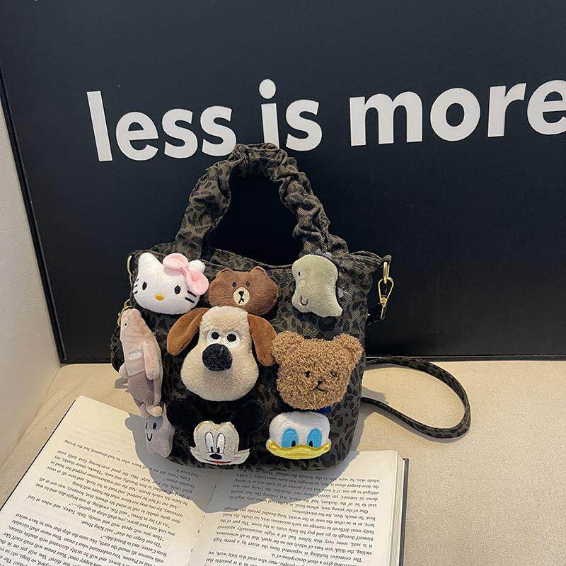 新品超火小众豹纹帆布包包女款春夏流行百搭斜挎包可爱卡通手提水