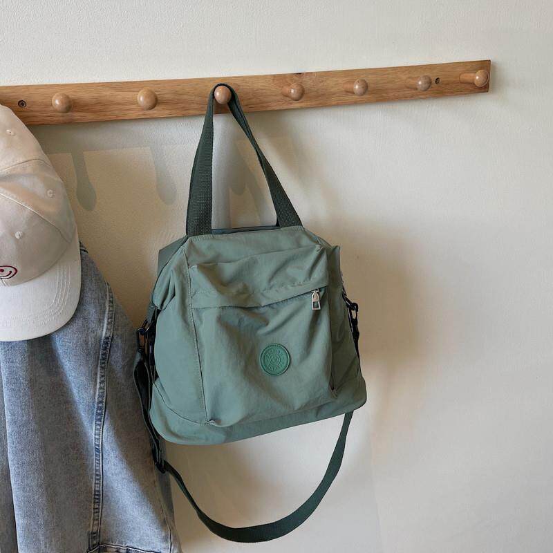 新品休闲包包女款2025新款流行大学生上课通勤斜挎单肩包大容量手