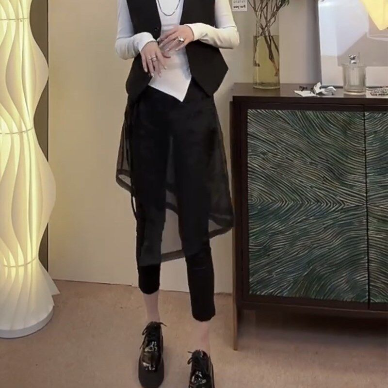 春秋新款小众设计感裙q裤女拼纱遮肉铅笔裤假两件显瘦个性九分裤