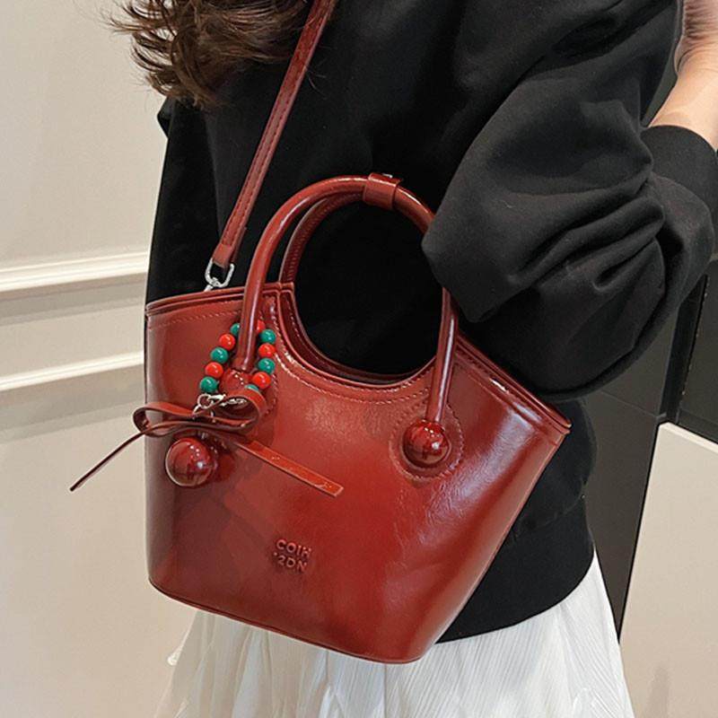 新品简约百搭手拎水桶包2025春季新款高级感时尚单肩包小众潮流斜,箱包皮具/热销女包/男包,水桶包,淘宝优惠券,粉丝福利购,淘宝优惠卷