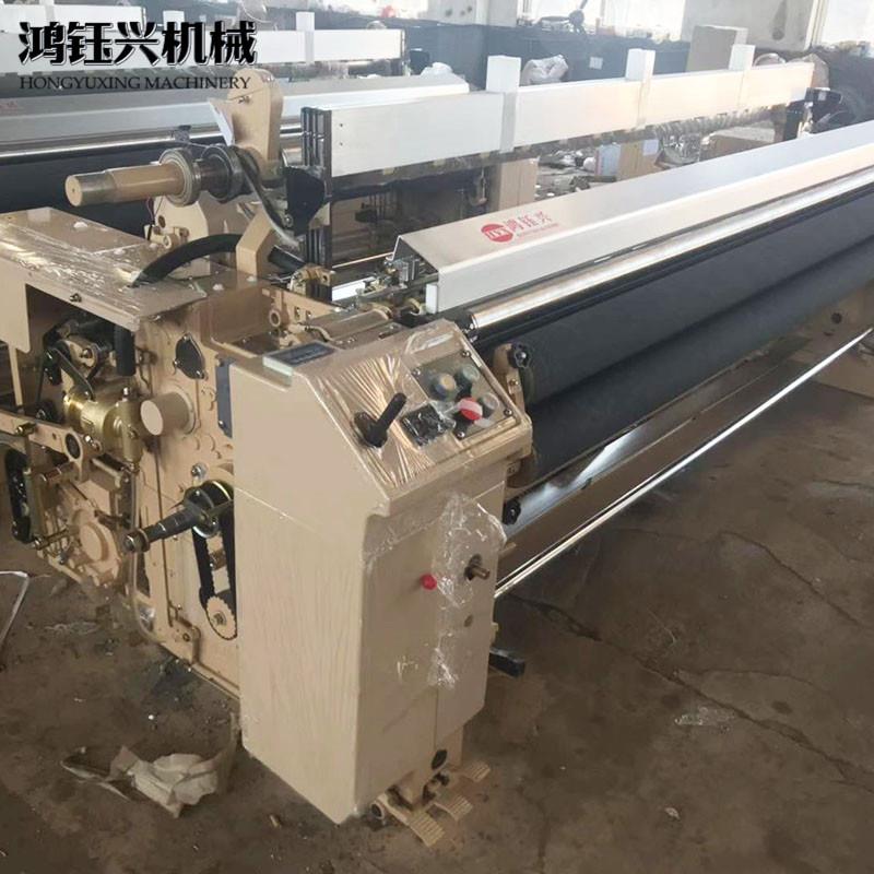 青岛高速喷水织机厂家重磅双喷高速高密度喷水式织布纺织机械