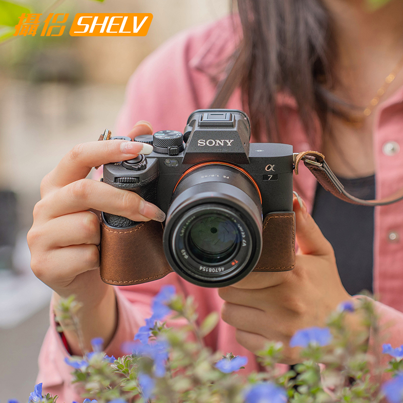 摄侣适用索尼A7M4保护套zve10相机包a7c2皮套zv1m2底座包a6700a7c相机套zve10二代真皮A7CRa7r5真皮Sony配件