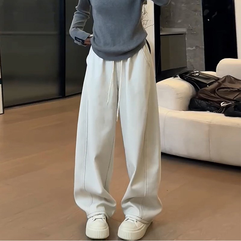 春季百搭牛仔裤女2025春款新款松紧腰简约休闲风弯刀显瘦长裤子