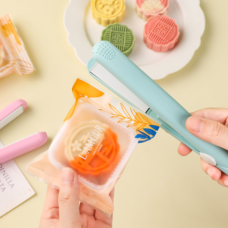 封口机小型家用月饼包装袋密封夹神器雪花酥零食手持可携式加热压,厨房/烹饪用具,封口机,淘宝优惠券,粉丝福利购,淘宝优惠卷