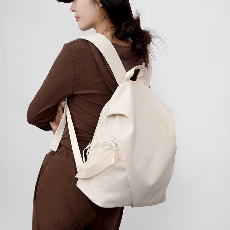 2025新款时尚大容量通勤轻便高颜值简约大学生上课双肩包书包男女