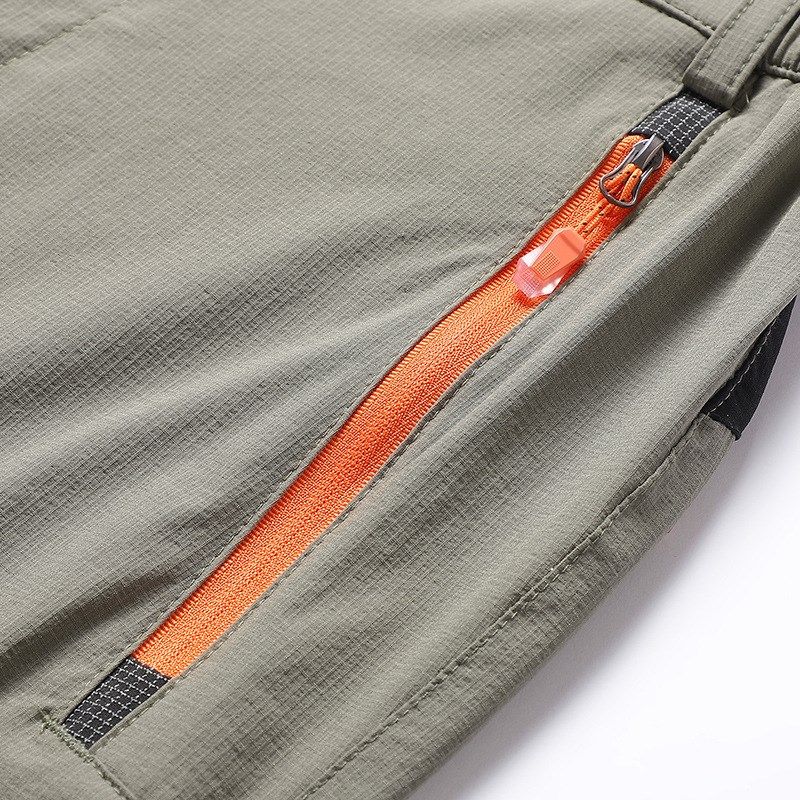 户外运动弹力速干裤男春夏季薄款登山裤女休闲宽松徒步冲锋裤